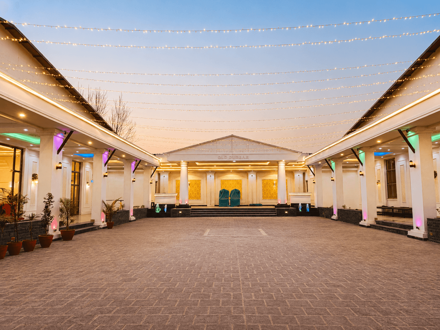 Grand dinner hall decorated for a Nepali wedding reception